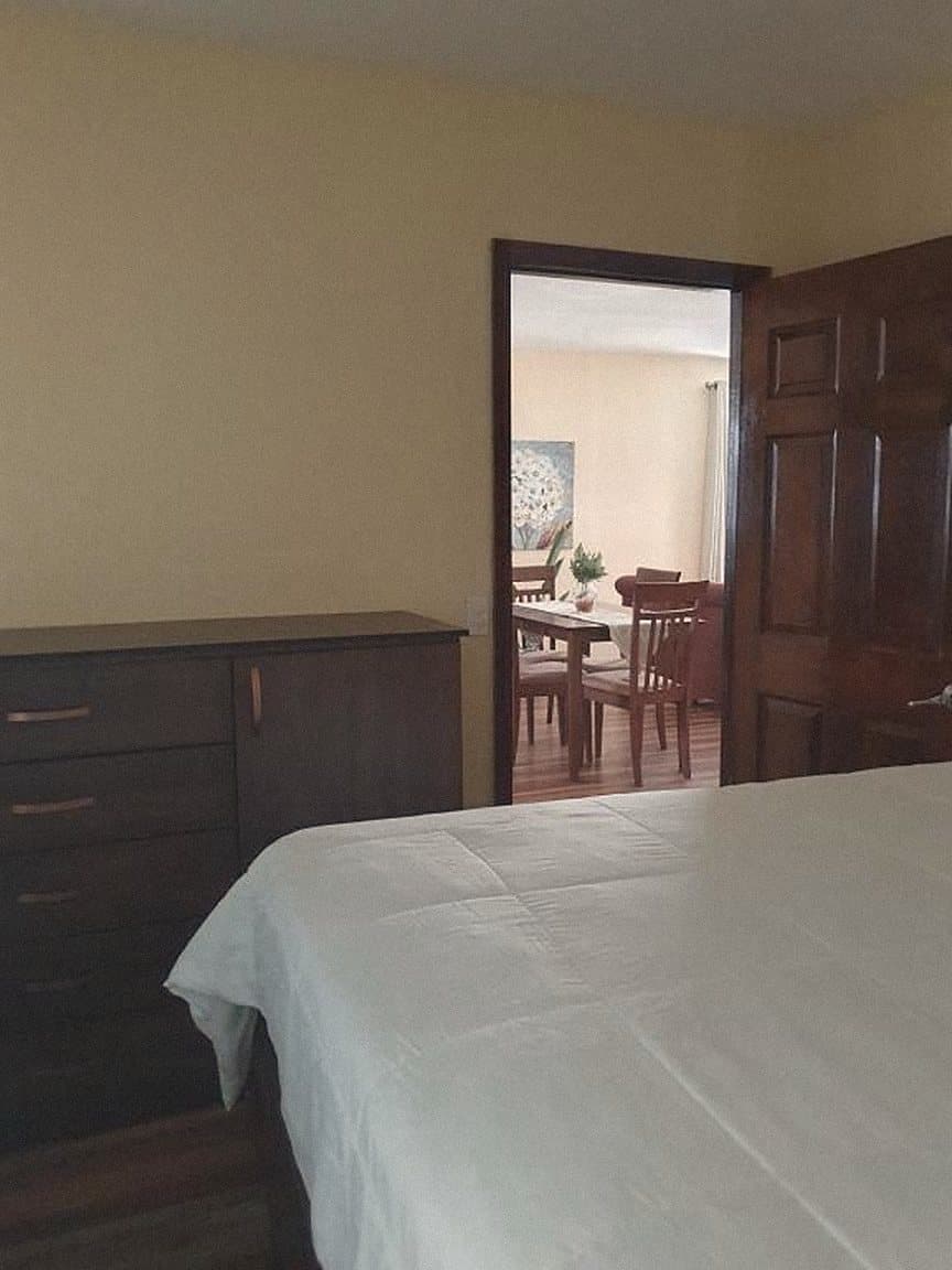 Bedroom with dark wood furniture