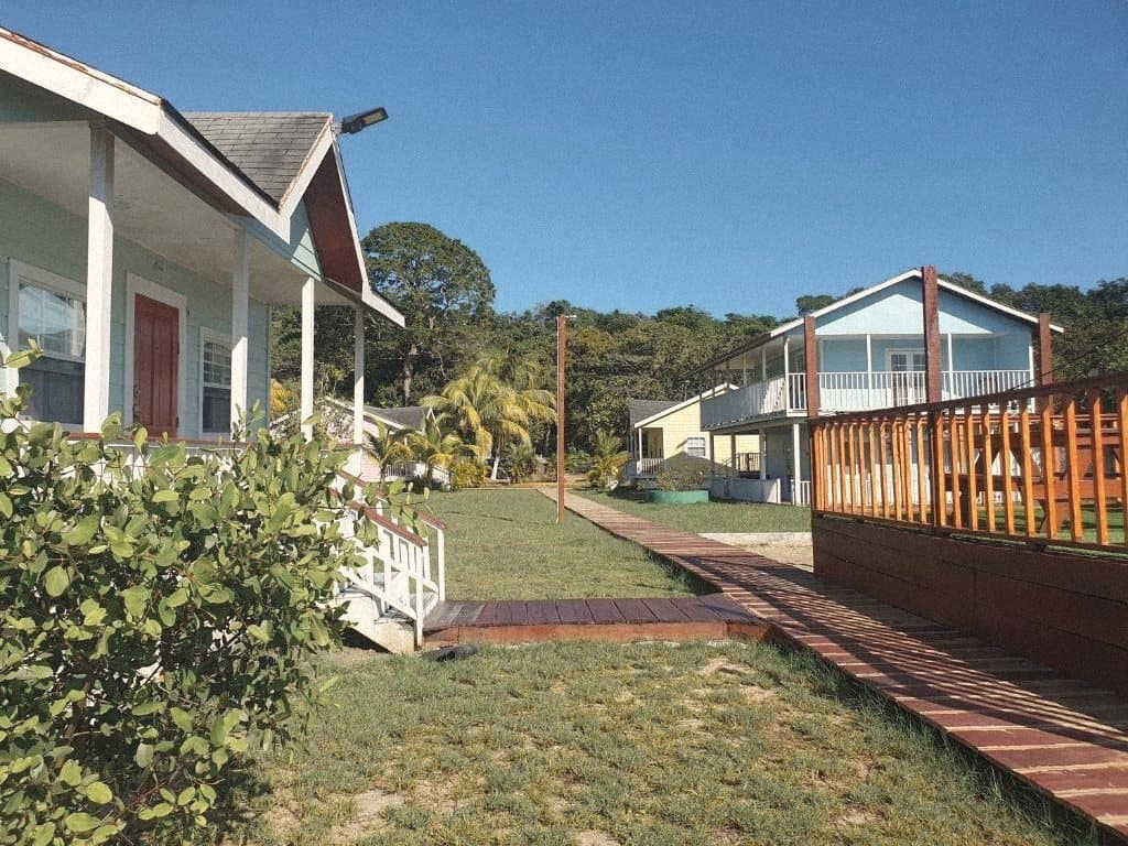 Blue cottages and the stained boardwalk